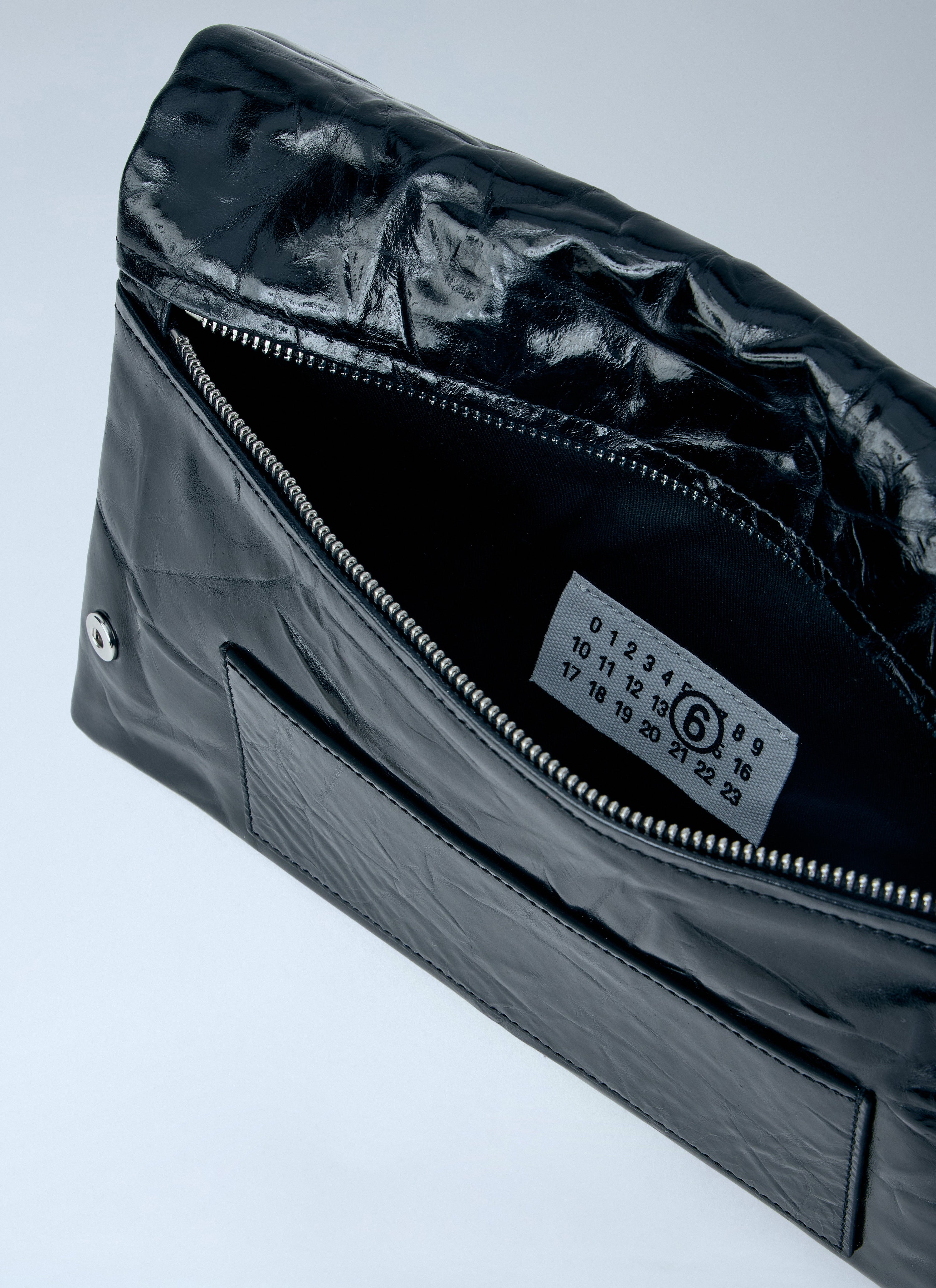 Single-stitch logo clutch bag