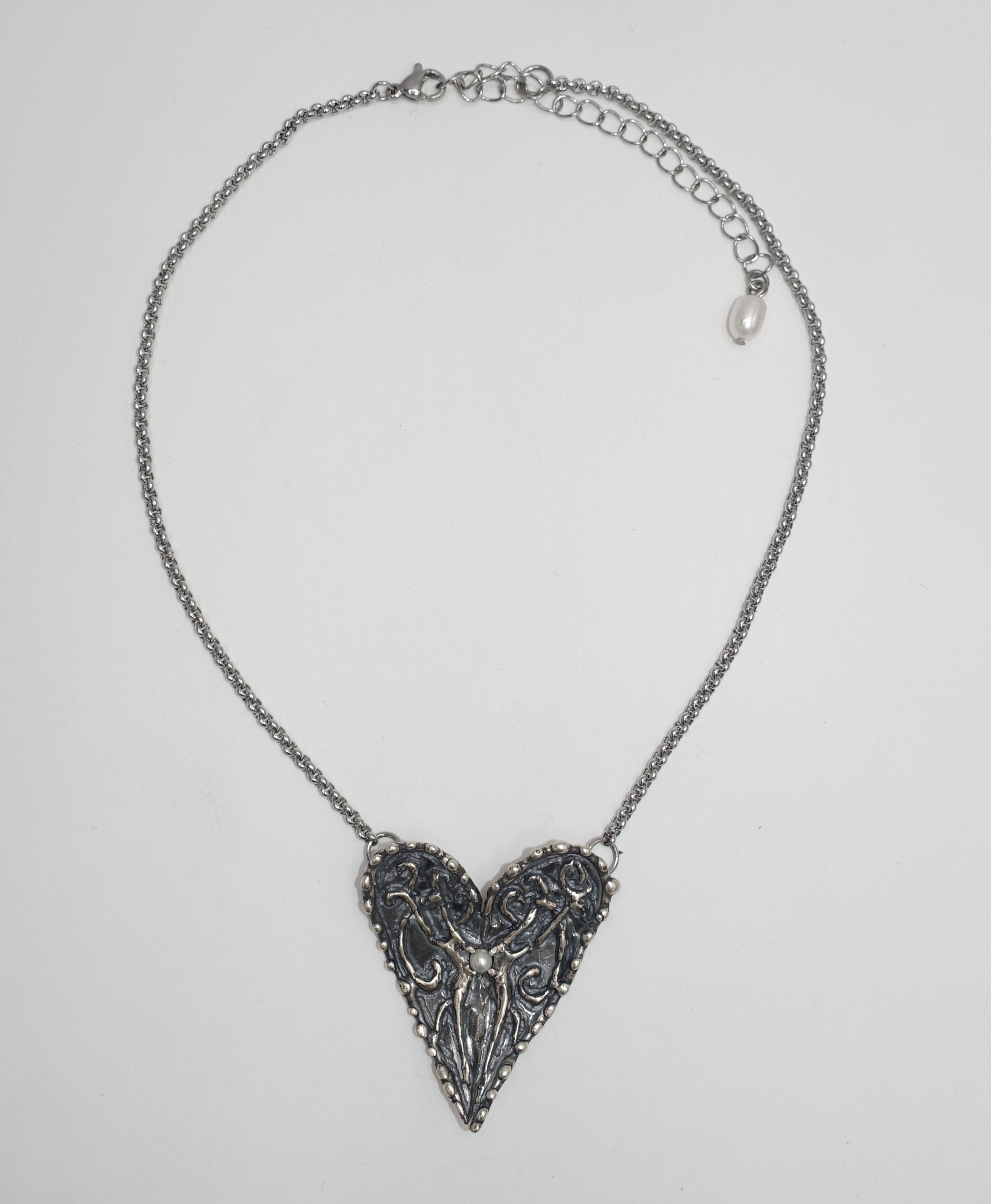 Maidenheart pendant antiqued