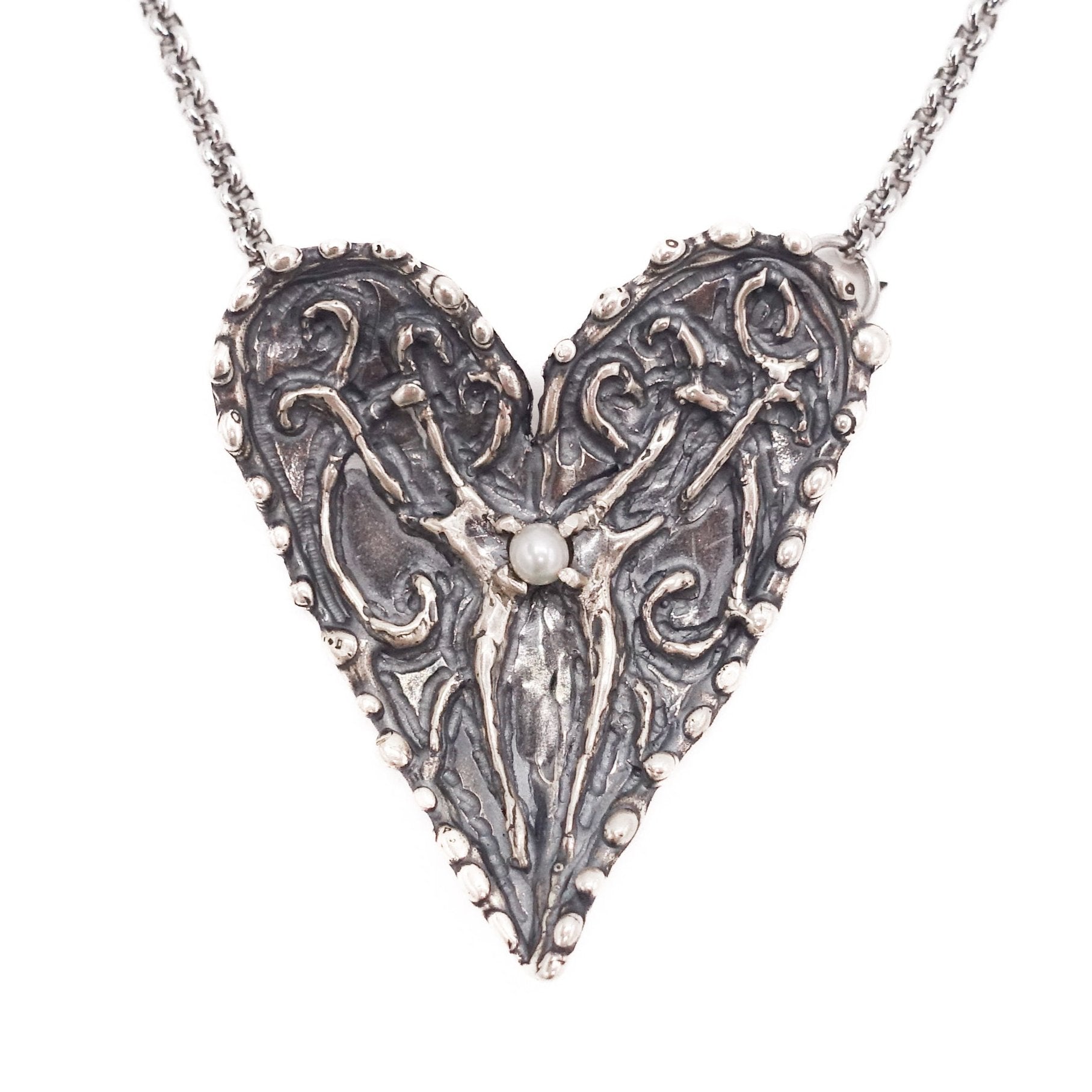 Maidenheart pendant antiqued