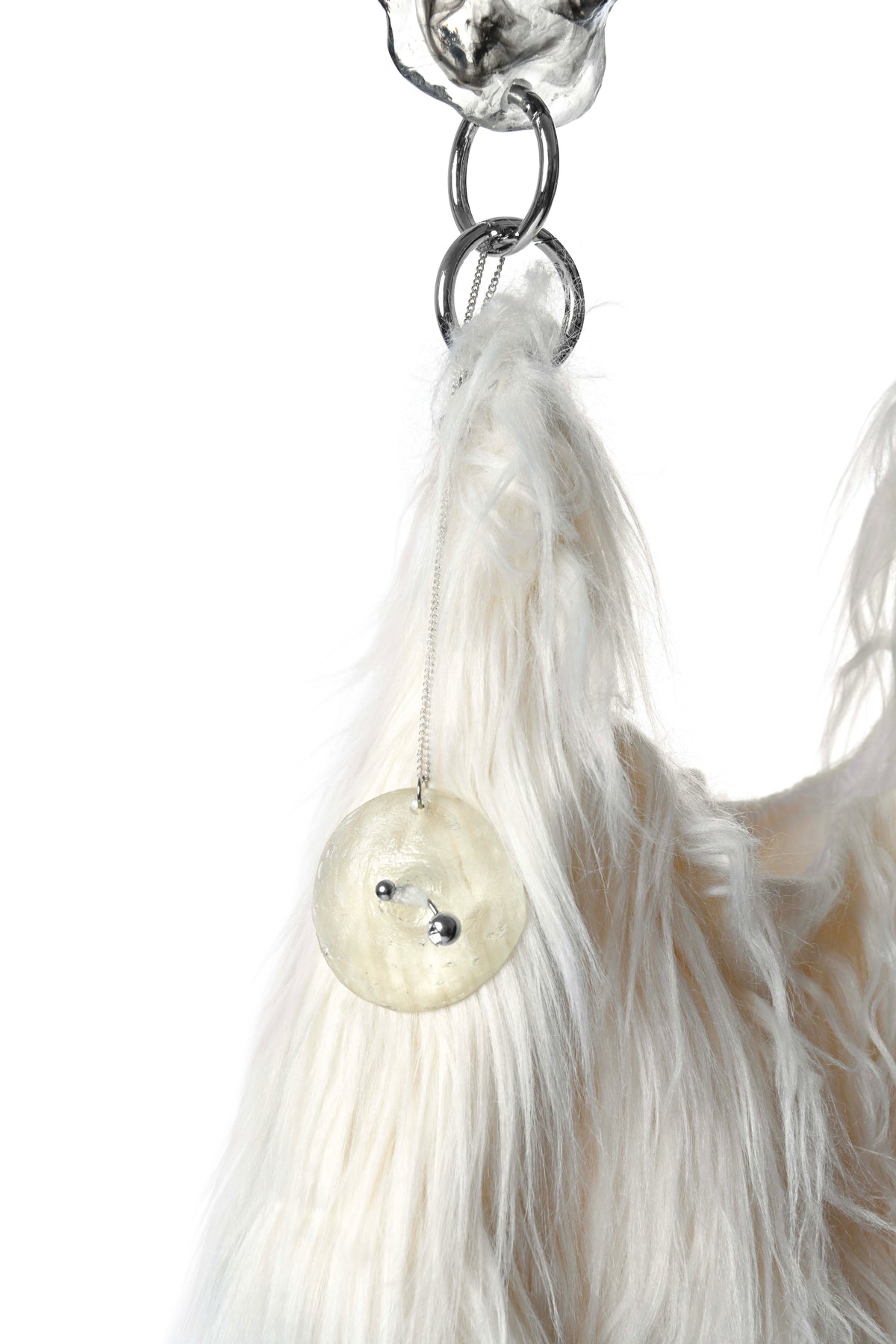 Fur handle bag with nipple charm